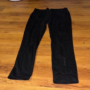 I am selling a pair of black skinny ripped jeans.